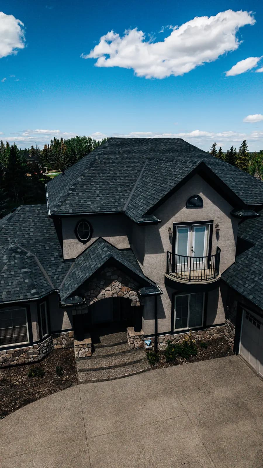 Front of a Calgary home with a newly finished roof